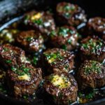 Garlic butter steak bites in skillet