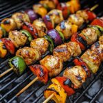 Grilled chicken skewers with vegetables on BBQ