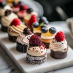 Mini cakes for a special treat on white marble tray