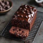 Triple chocolate mini loaf sliced to show gooey melted chocolate inside