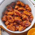 3-Ingredient Orange Chicken dish garnished and ready to serve