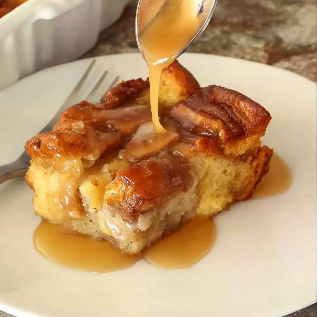 Delicious homemade bread pudding served with caramel sauce