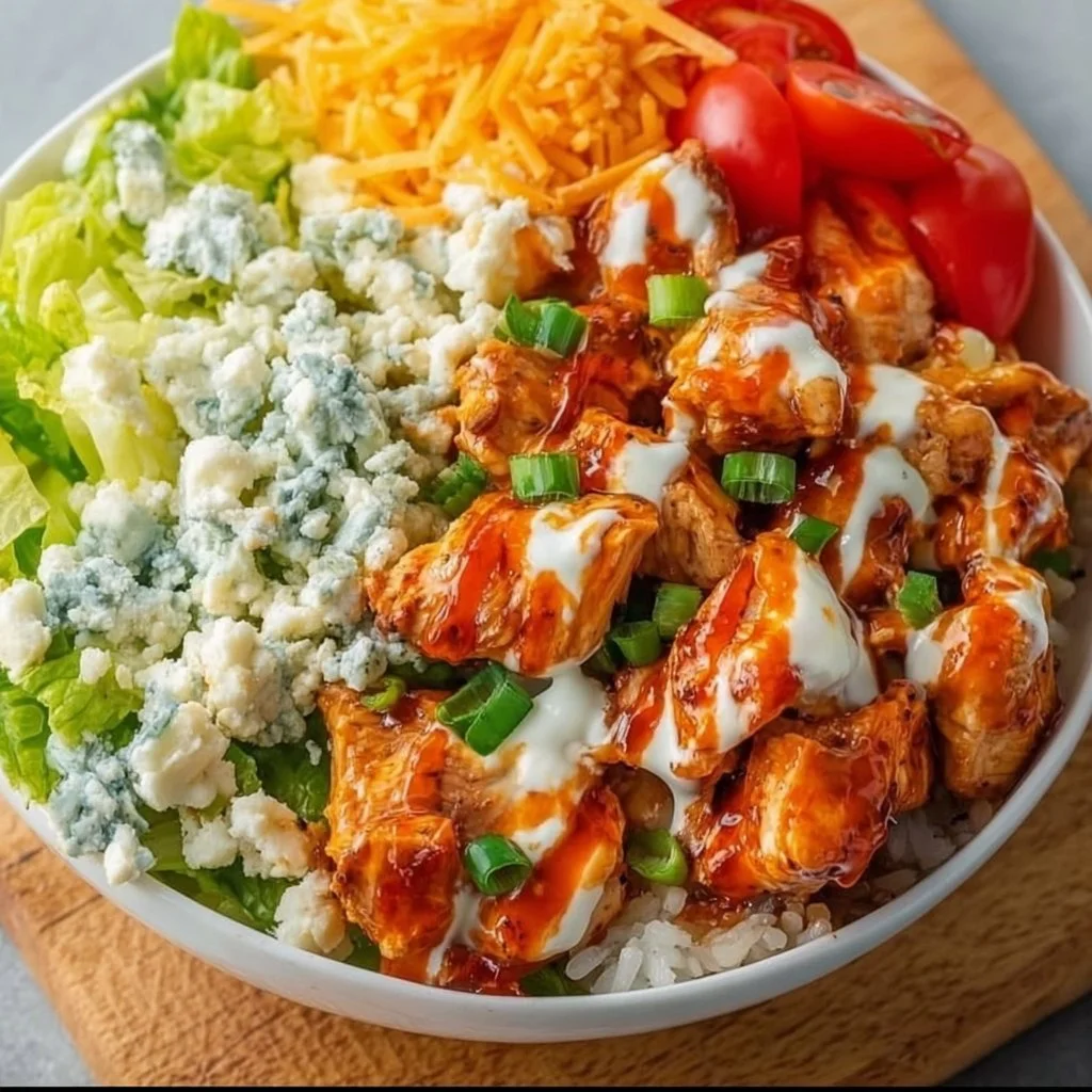 Buffalo Chicken Protein Bowl with fresh veggies and sauce