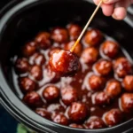 Delicious grape jelly meatballs served as an appetizer.