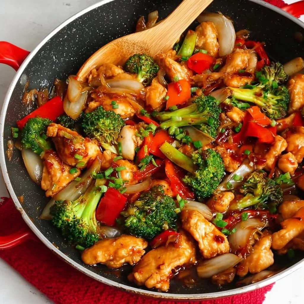 Plate of Hunan Chicken with vegetables and spices