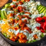 Delicious Buffalo Chicken Bowls served in a vibrant bowl with fresh toppings