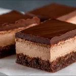 Delicious chocolate mousse brownies with a rich chocolate layer