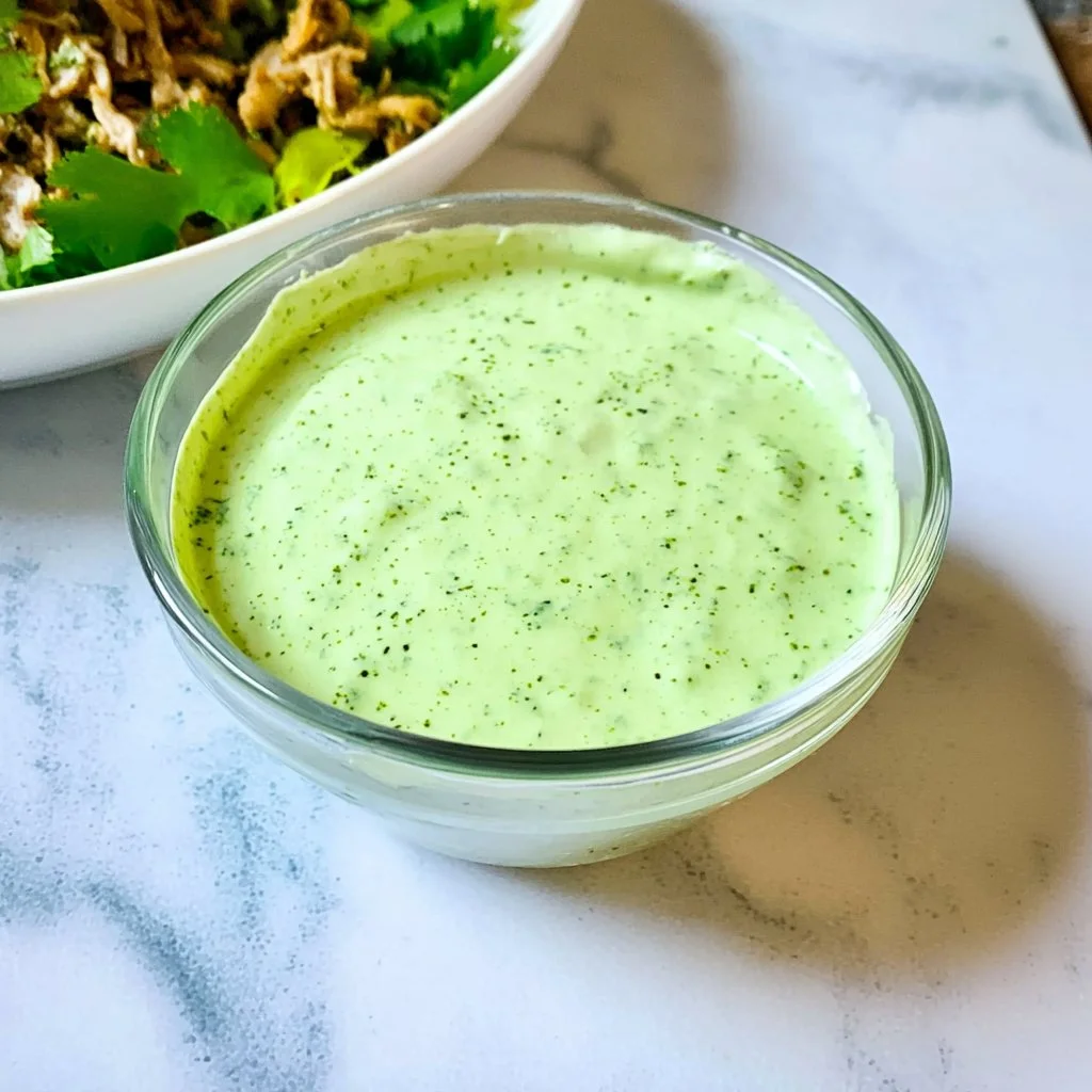 Cilantro yogurt sauce drizzled over grilled vegetables and meat.