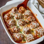 Delicious meatballs parmesan served with cheesy goodness and marinara sauce