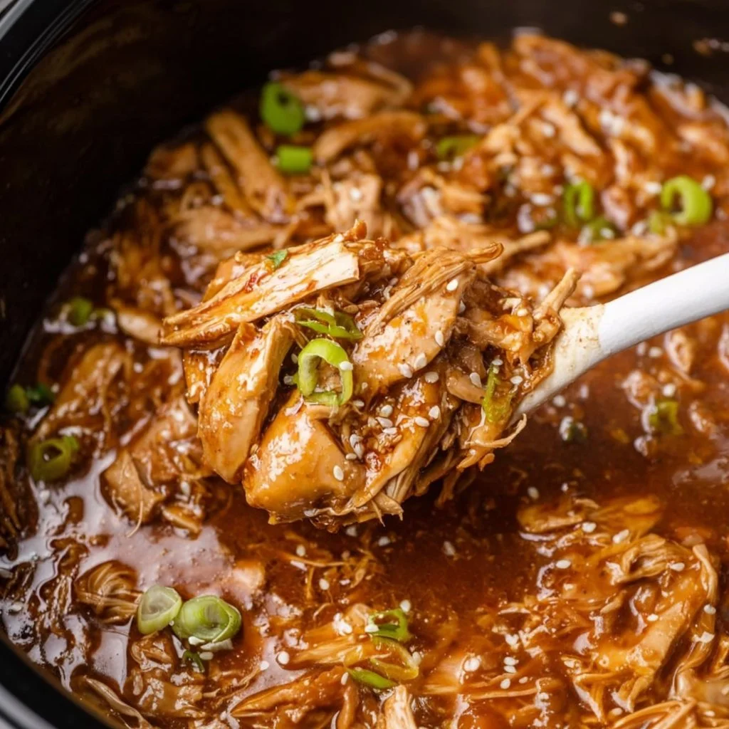 Crock Pot Honey Garlic Chicken served with vegetables in a cozy home setting