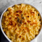 High Protein Cottage Cheese Mac and Cheese in a bowl with a cheesy top