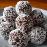 No bake chocolate coconut treats on a plate