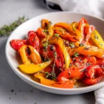 Oven roasted mini peppers with vibrant colors and seasonings
