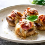 Delicious pizza stuffed mushrooms with cheese, pepperoni, and herbs