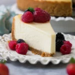 Delicious slice of the best cheesecake topped with fresh berries