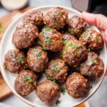 Delicious air fryer meatballs served in a cozy setting for a perfect evening meal.
