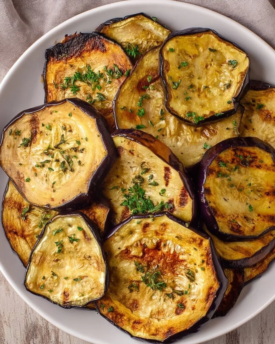 Deliciously crispy Air Fryer Eggplant slices served with a dipping sauce