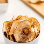 A bowl of homemade apple chips ready for a healthy snack