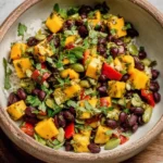 Colorful Black Bean Mango Salsa Bowl with fresh ingredients