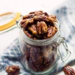 Delicious homemade candied pecans in a bowl