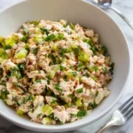 Delicious French-Style Tuna Salad garnished with fresh herbs and vegetables