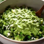 Delicious Green Goddess Salad with fresh vegetables and creamy green dressing