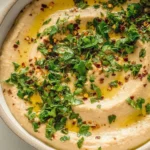 Creamy lemon garlic white bean dip served with fresh vegetables