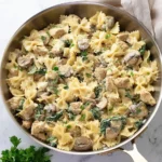 Creamy mushroom chicken pasta with tender chicken and fresh herbs