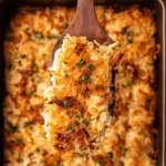 Delicious Southern Hashbrown Casserole baked with cheese and crispy toppings