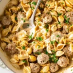 Delicious bowl of Swedish Meatball Pasta with creamy sauce and herbs