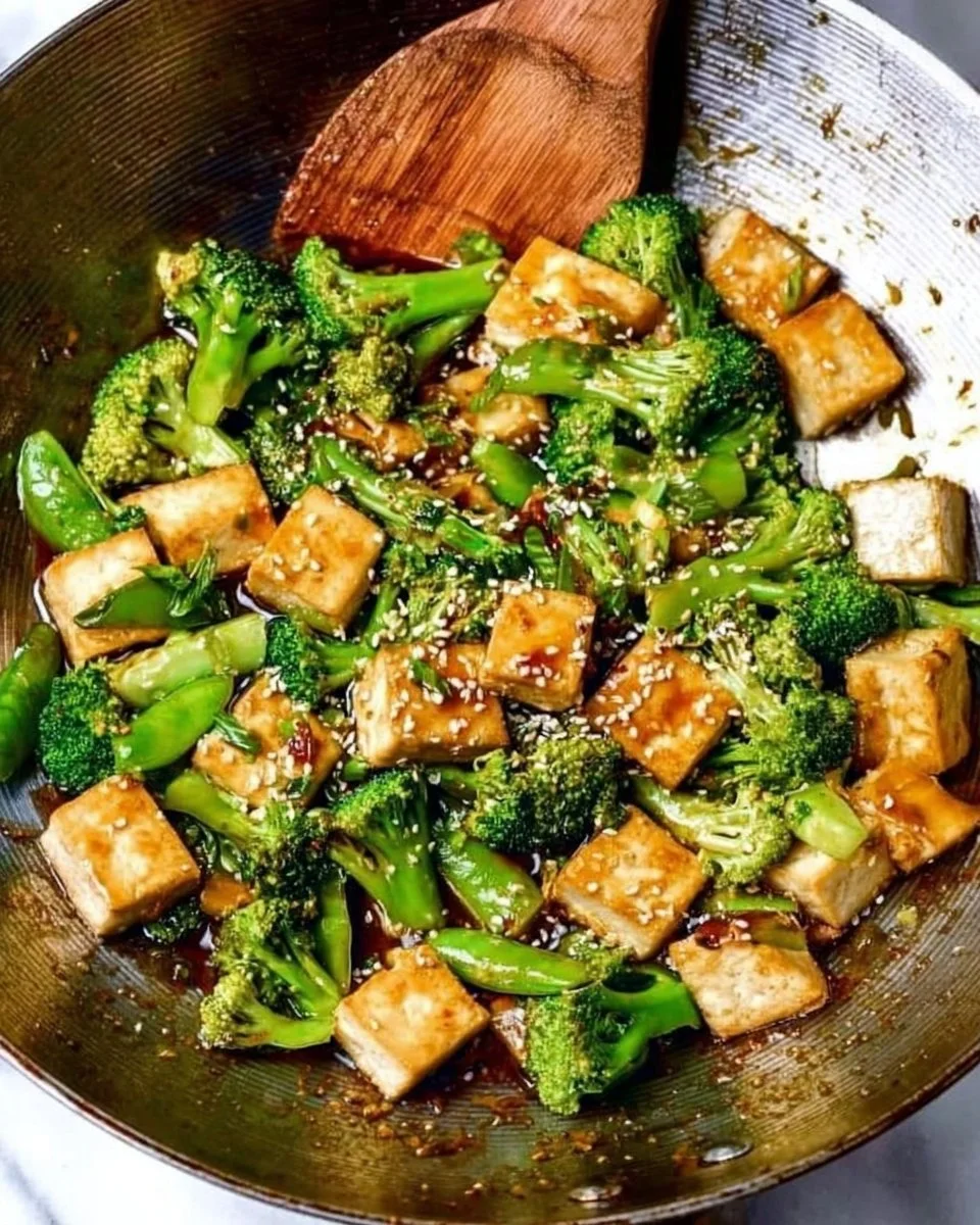 Stir fry teriyaki tofu and broccoli served in a colorful bowl