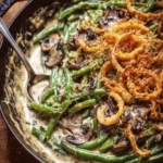 Creamy mushroom green bean casserole topped with crispy onions