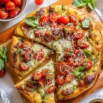 Delicious Bruschetta Pizza topped with fresh tomatoes and basil