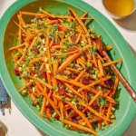 Colorful carrot salad with dates and nuts for a healthy meal