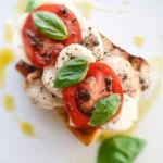Delicious Chicken Caprese Sandwich with chicken, mozzarella, tomatoes, and basil