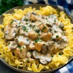 Delicious Chicken Stroganoff served with pasta on a plate