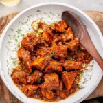 Delicious Chicken Vindaloo served with rice and spices