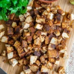 Delicious Chipotle chicken dish served on a plate with fresh ingredients.