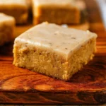 Delicious coffee blondies topped with chocolate chips and coffee flavor