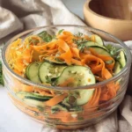 Fresh cucumber carrot salad with vibrant colors and healthy ingredients