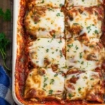 Delicious Eggplant Lasagna served with fresh herbs and cheese.