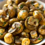Delicious garlic mushrooms sautéed in rich butter sauce