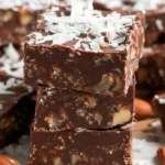 Delicious German Chocolate Cake Fudge topped with coconut and pecans