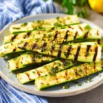 Delicious grilled zucchini on a plate ready to serve.