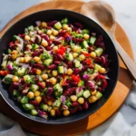 Colorful Mediterranean Bean Salad with fresh vegetables and herbs