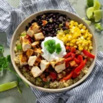 Mexican Chicken Quinoa Bowl with fresh ingredients and spices