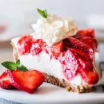 No bake strawberry pie with cream cheese filling topped with fresh strawberries