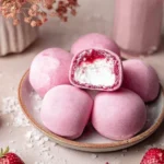 Delicious Strawberry Mochi Ice Cream dessert served in a bowl