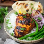 Deliciously plated Tandoori Chicken, marinated with spices and grilled to perfection