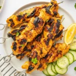 Delicious Tandoori Chicken Skewers ready to be served on a platter